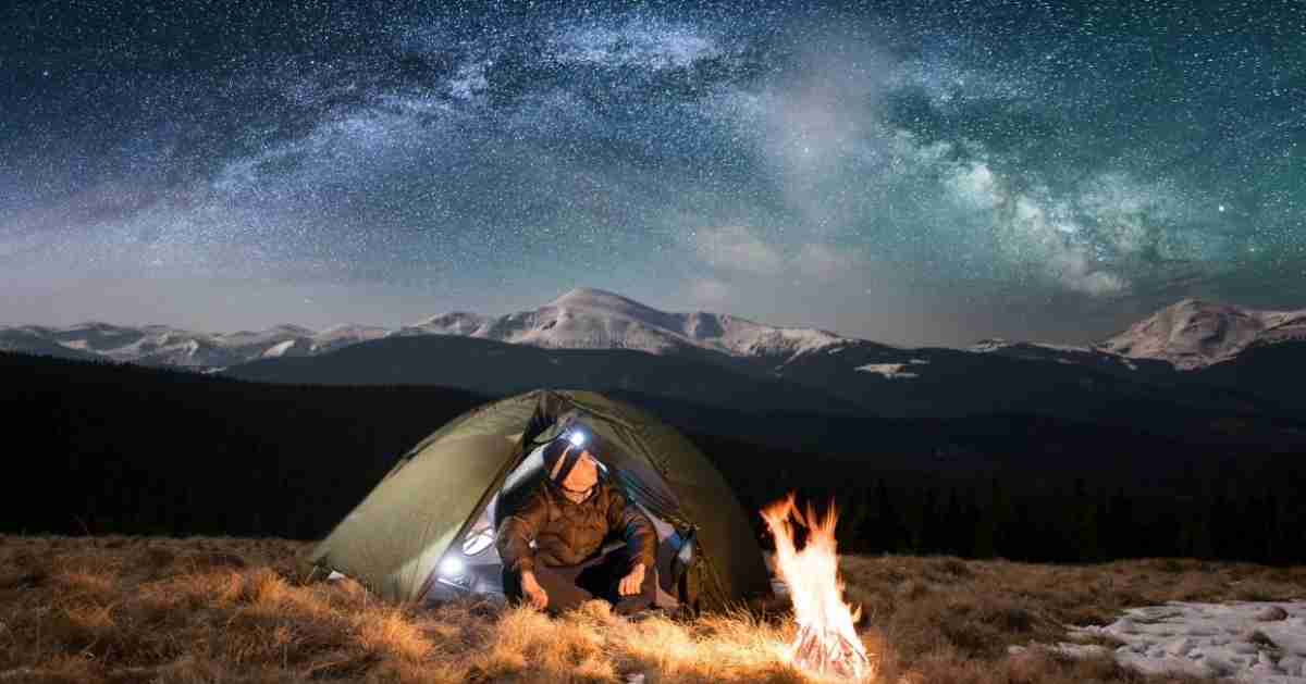 What are the advantages of bringing a headlamp when you go camping?